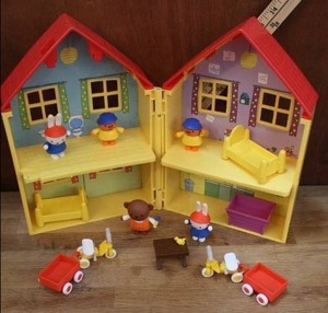 lot 52 image: Previously loved playhouse with figure see pictures