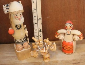 lot 47 image: Mockba Kokeshi Peg Doll Old Man Carrying Wood Waking Stick Handpainted Carved and Vintage Wooden Folk Art Woman Carrying Pigs Under Arms and more see pictures