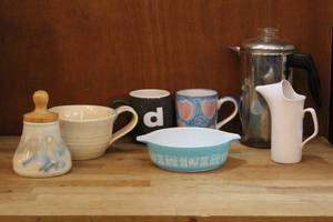 lot 40 image: handcrafted pottery pieces, Pyrex bowl, and much more see pictures