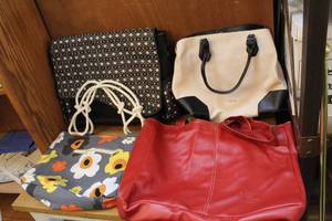lot 37 image: Mixed Lot of hand bags theres farmhouse is my  style and VFW one and nine west and creative memories