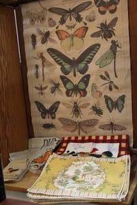 lot 19 image: Butterfly tapestry and rooster placemats and rooster washable napkins and more see pictures