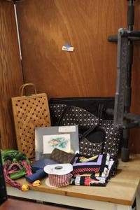 lot 16 image: Mixed Lot has  basket wind bottle holder -tote bag -scotch tape gun -rainbow trout pic and much more see pictures
