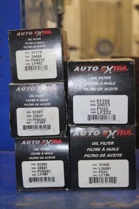lot 28 image: Five Auto Extra Oil Filters, for Various Acuras Chevy GMC, Isuzu, Susuki, Oldsmobile, Jeep, Pontiac, Landrover,