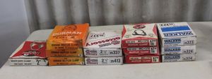 lot 35 image: Twelve Hose Clamps Variety of Sizes