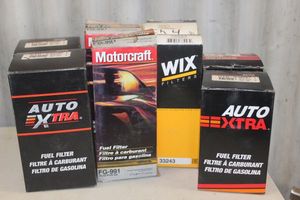 lot 63 image: NEW Auto Extra, Motorcraft, and Wix fuel filters