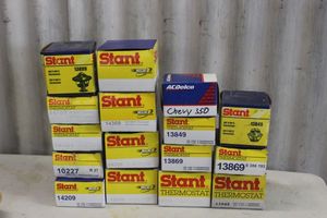 lot 64 image: NEW AC Delco and Stant thermostats