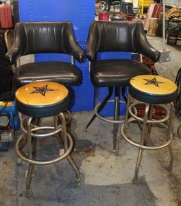lot 75 image: Dallas Cowboys logo bar stools (2) plus mid back bar stools (2) (Bid is times the quantity of 4)