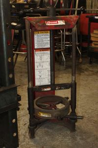 lot 83 image: Branick model 7200 strut spring compressor