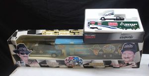 lot 95 image: Lionel NASCAR die cast trucks