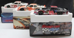 lot 19 image: Three Kevin  Harvick #29 124 Scale Stock Car, 2004 Monte Carlo, GM GoodwrenchRealtree 2004 Monte Carlo and GM Goodwrench Serivice Plus, Oreo 2001 Monte Carlo all in Orginal Boxes