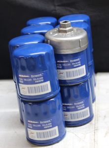 lot 112 image: NEW AC Delco oil filters plus filter wrench attachment