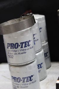 lot 113 image: NEW Pro-Tec oil filters plus filter wrench