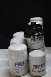 lot 119 image: NEW Pro-Tec oil filters plus filter wrench attachment
