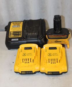 lot 156 image: Dewalt rechargeable batteries plus charging station