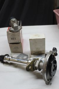 lot 168 image: Distributor rotor plus assorted auto parts as shown
