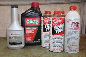 lot 174 image: Assorted transmission fluids as shown