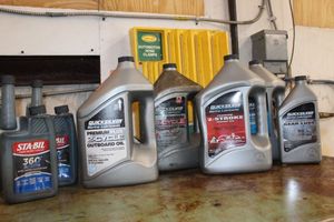 lot 175 image: Assorted two stroke oils as shown