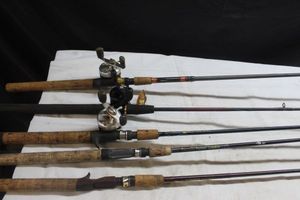 lot 200 image: Assorted fishing rods and reels as shown