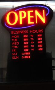 lot 206 image: Illuminated OPEN sign with store hours