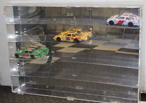 lot 216 image: NASCAR Die cast cars and display