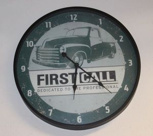 lot 228 image: First Call wall clock