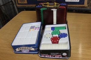 lot 297 image: Poker chips and Dominoes games