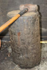 lot 322 image: Sledge hammer and pounding block