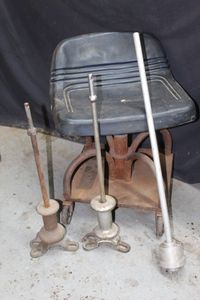 lot 310 image: Mechanics chair and ram rods