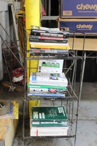 lot 335 image: Automotive Books and Stand