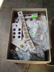 lot 55 image: small box of buttons and shirt pins