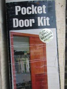 lot 93 image: pocket door kit NIB