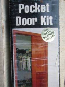 lot 94 image: pocket door kit NIB