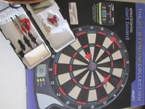 lot 111 image: dart board with various darts