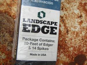 lot 164 image: Landscaping edge package contains 20 feet of edge plus 14 spikes