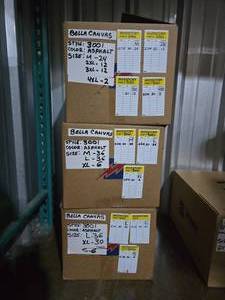 lot 13 image: 3 Boxes of Bella Canvas 3001 Unisex 100% Soft Cotton Ashphalt (Dark Grey) Adult Tee Shirts, SEE DESCRIPTION FOR SIZES AND QUANTITIES  BID IS TIMES THE QUANTITY SO YOU ARE BIDDING PER BOX