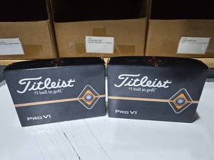 lot 102 image: Titleist Pro V1 Golf Balls, 1 Dozen Per Box  QUANTITY 2 BOXES  BID IS TIMES THE QUANTITY