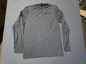 lot 204 image: WOW  5 Boxes of District DT6200 Very Important Long Sleeve Heathered Charcoal Cotton Shirts,  SEE DESCRIPTION FOR SIZES AND QUANTITIES  BID IS TIMES THE QUANTITY SO YOU ARE BIDDING PER BOX