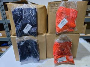 lot 173 image: 4 Boxes of Core365 Polo Shirts.  Includes 2 Boxes of Navy & 2 Boxes of Orange.  Approx 40 Shirts Per Box.  Shirts have embroidered logos.