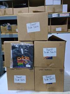 lot 176 image: 5 Boxes of Boost Mobile Pride Shirts.  Misc Sizes.  Approx 70 Shirts Per Box