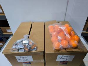lot 292 image: 2 Boxes of Misc Boost Mobile Promo Products.  Stress Balls, Pens & 1000 Packs of Breath Mints.