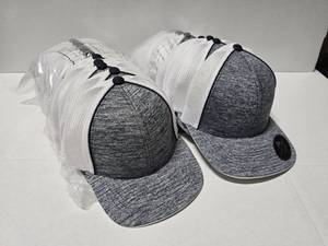 lot 315 image: Pacific Headwear 406F Aggressive Black Heather Trucker Mesh Flexfit Hat.  Approx 12 Hats Per Pack.  SEE PICS FOR SIZES & COUNTS  QUANTITY 2 PACKS  BID IS TIMES THE QUANTITY