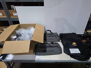 lot 342 image: Large Lot of Misc Boost Mobile Promotional Products.  Includes Patches, Tote Bags & Waterproof Bags