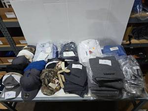 lot 366 image: Large Lot of Schlumber Embroidered Shirts, Hats, Scarves & Beanies & More.  Over 100 Total Pieces