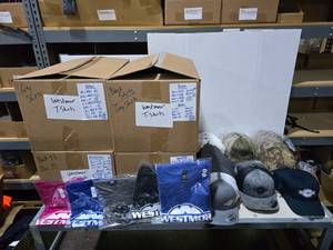 lot 463 image: Large Lot of Misc Westmor Shirts & Hats.  Includes 61 Hats & Approx 159 Shirts.  SEE PICS FOR SHIRT STYLES & SIZE COUNTS