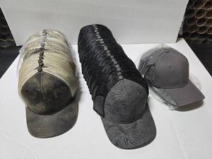 lot 473 image: Lot of 34 Dri-Duck Hats.  Includes 3466 Covert Trucker (Qty 17), 3458 Territory Cap (Qty 23) & 3330 Oil Field (Qty 4)