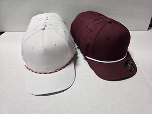lot 475 image: Lot of Approx 30 Cap America Performance Banded Caps.  Includes White w Red Band (Qty 15) & Maroon w White Band (Qty 15)
