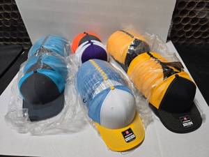 lot 479 image: Lot of 55 Richardson 122 Snapback Trucker Hats.  Inludes CharcoalNeon Blue, YellowWhiteColumbia Blue, PurpleWhite, CharcoalNeon Orange & BlackYellow