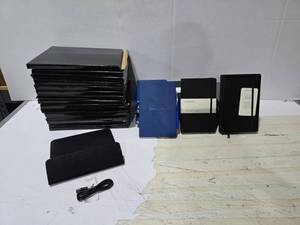 lot 497 image: Large Lot of Misc Superior Items.  Includes Wireless Charging Mouse Pad (Qty 15), Notebooks (Qty 8), Moleskin Notebooks (Qty 6) & Italian Leather Notebooks (Qty 5)