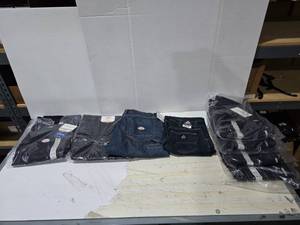 lot 511 image: Lot of 8 Pairs of Flame Resistant Pants.  Misc Sizes.  SEE PICS FOR SIZE COUNTS
