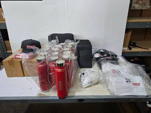 lot 515 image: Large Lot of Misc Goodman Items.  Includes Tumblers, Hats, Pens, Day Planners, Golf Divot Tools & Masks